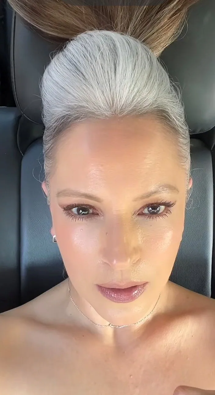 Adriana, silver-haired woman from Dallas, Texas, sharing her going-gray story