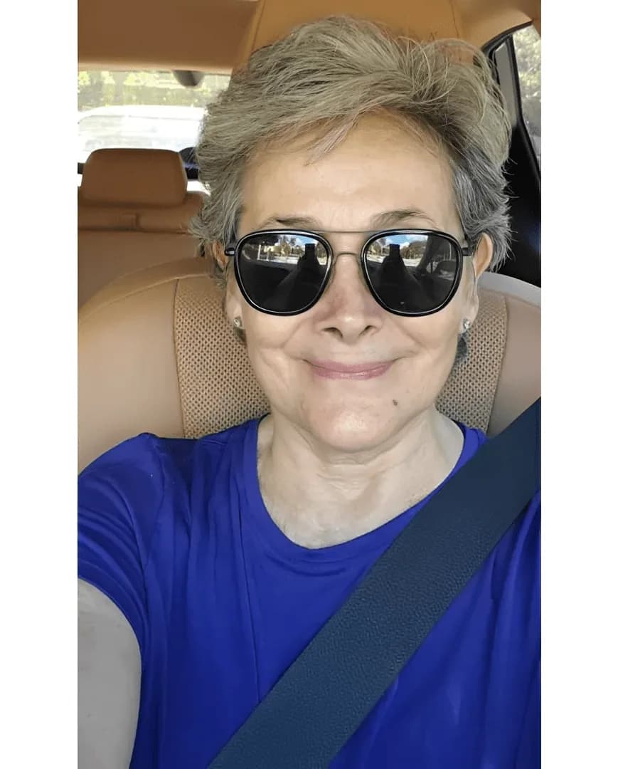 Rita, silver-haired woman from Miami, Florida, sharing her going-gray story