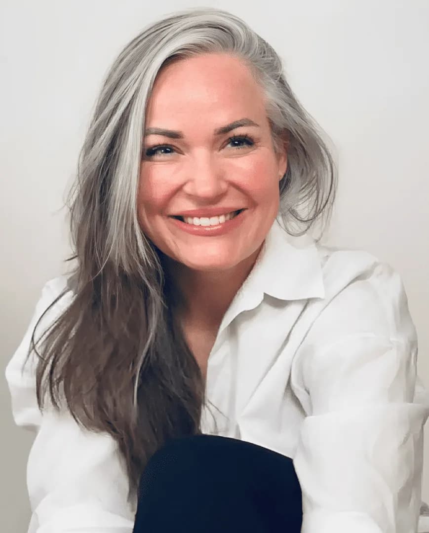 Anik, silver-haired woman from Ottawa, Canada, sharing her going-gray story
