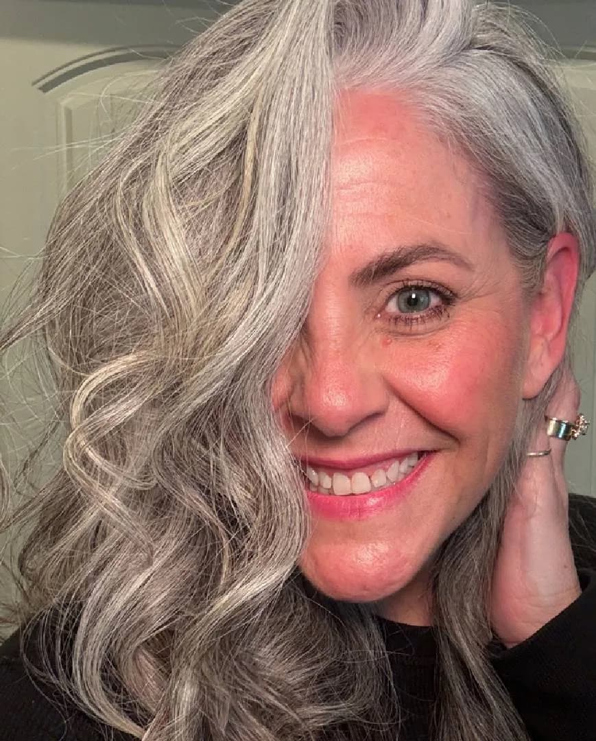 Cassie, silver-haired woman from McPherson, Kansas, sharing her going-gray story