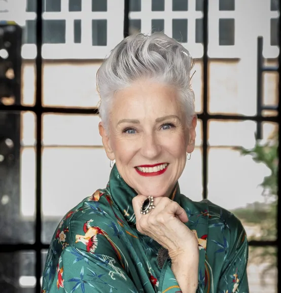 Deborah, silver-haired woman from Johannesburg, South Africa, sharing her going-gray story