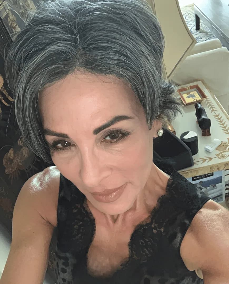 Donna, silver-haired woman from Miami, Florida, sharing her going-gray story