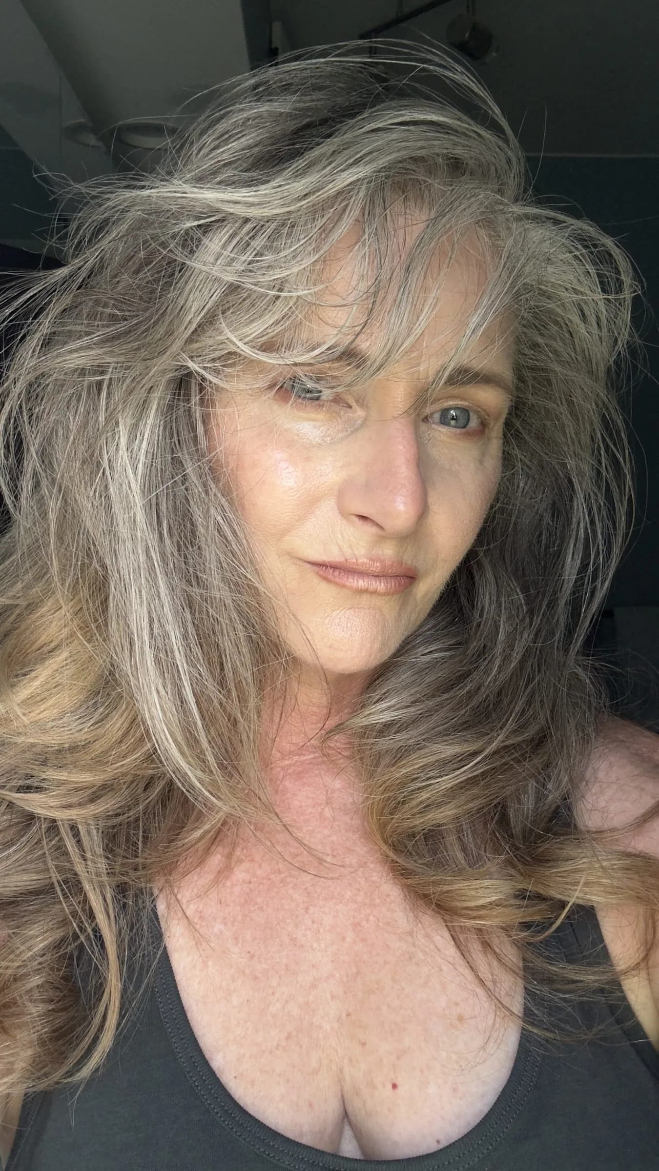 Helen, silver-haired woman from Petrolia, Canada, sharing her going-gray story