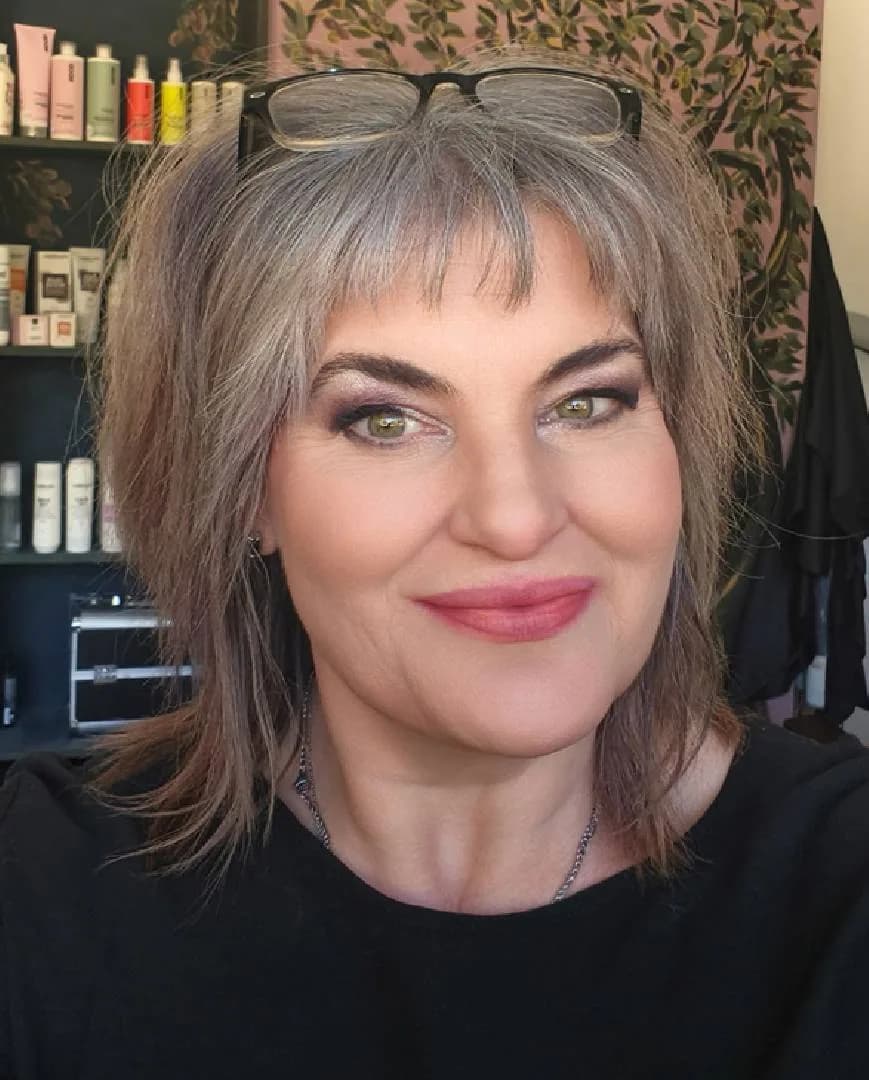Ina, silver-haired woman from Klerksdorp, South Africa, sharing her going-gray story