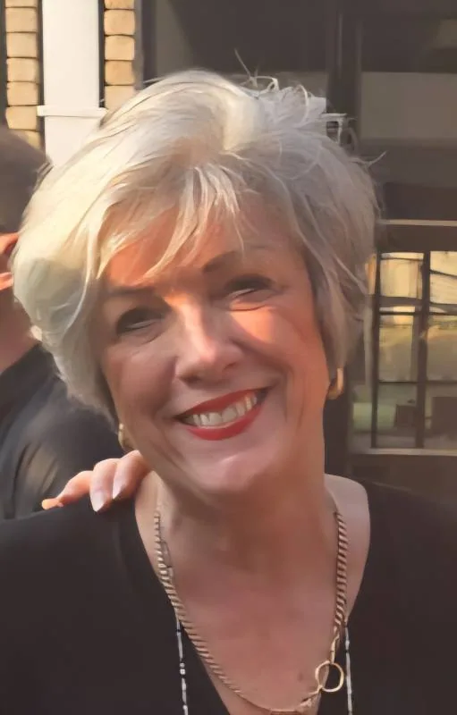 Ingrid, silver-haired woman from Gauteng, South Africa, sharing her going-gray story