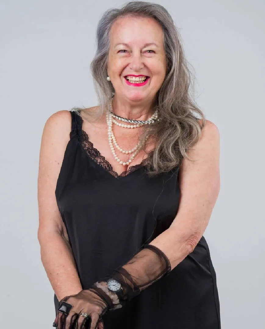 Ingrid, silver-haired woman from Gauteng, South Africa, sharing her going-gray story