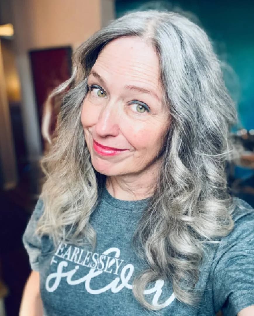 Katie, silver-haired woman from Los Angeles, California, sharing her going-gray story