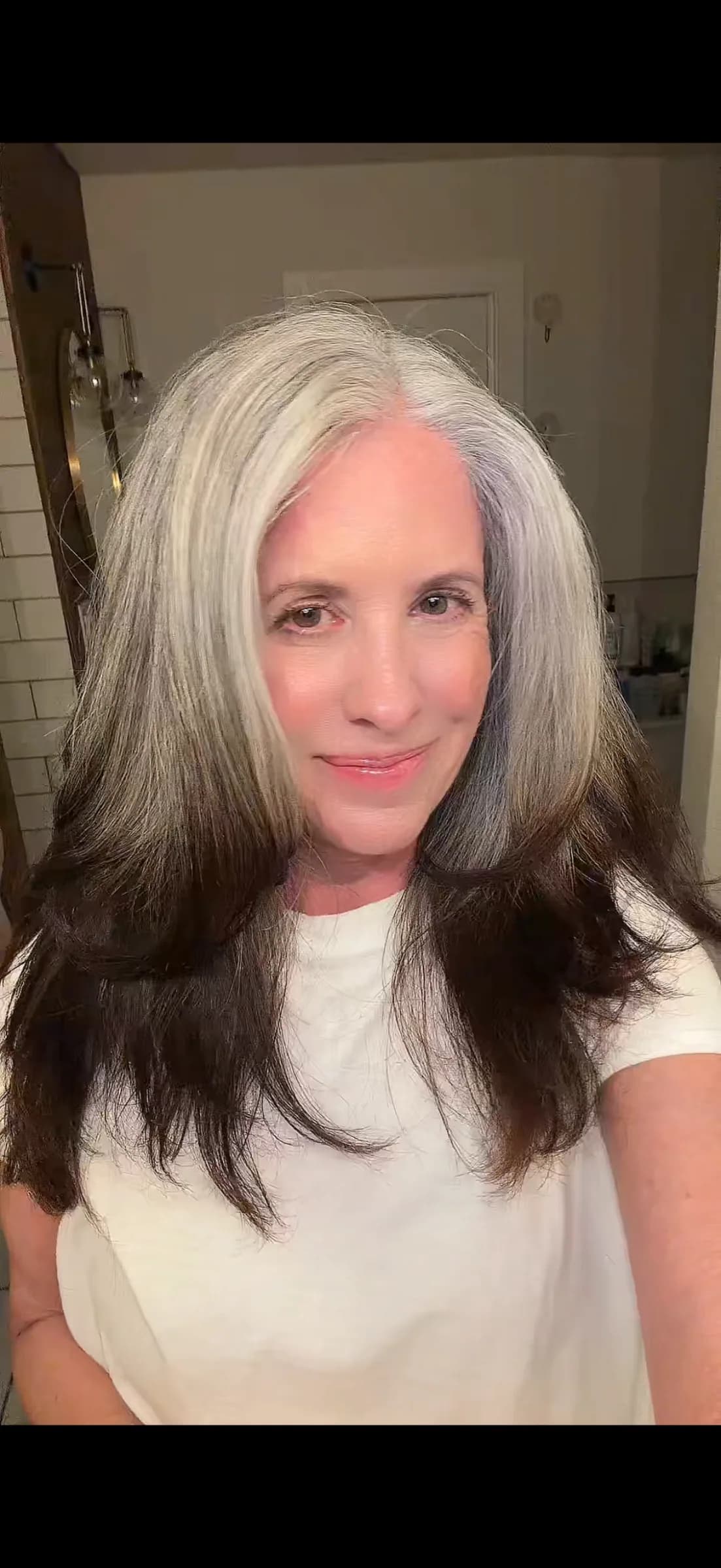 Kelly, silver-haired woman from Manteca, California, sharing her going-gray story
