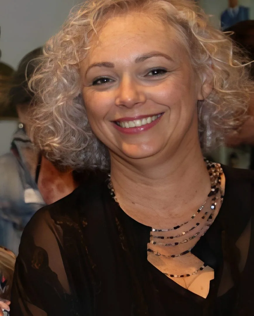 Kirsten, silver-haired woman from George, South Africa, sharing her going-gray story