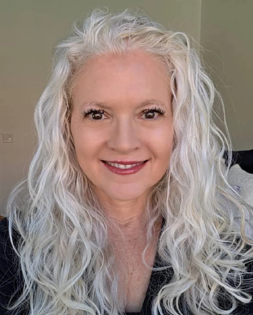 Laura, silver-haired woman from Ivins, Utah, sharing her going-gray story