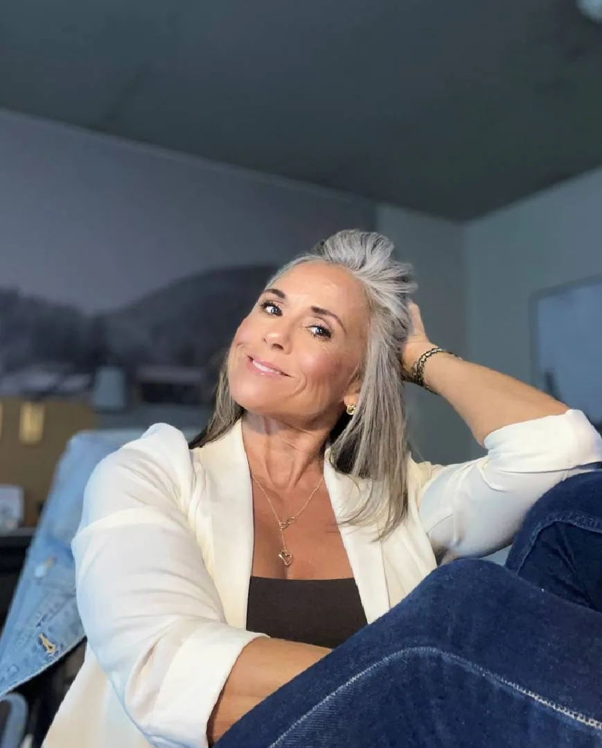 Rita, silver-haired woman from Sugar Land, Texas, sharing her going-gray story