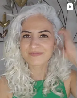 Sibel, silver-haired woman from Istanbul, Türkiye, sharing her going-gray story