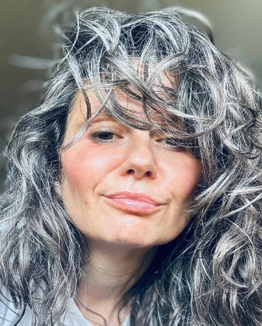 Lilia, silver-haired woman from Bulgaria, sharing her going-gray story