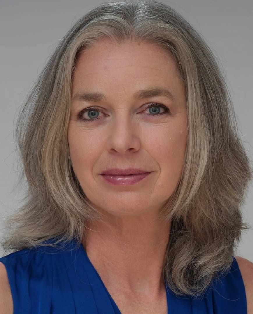 Vivian, silver-haired woman from Hoorn, Netherlands, sharing her going-gray story