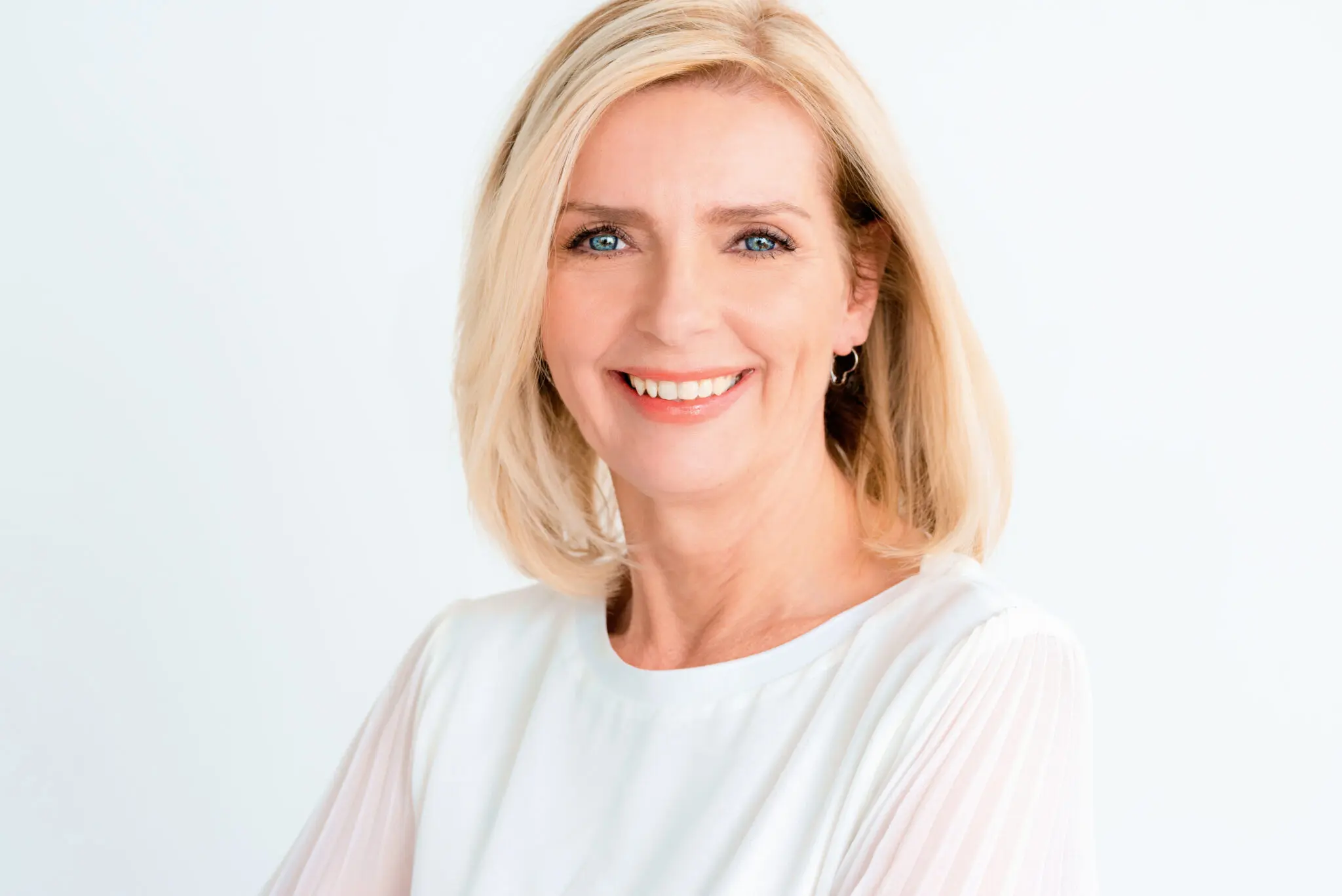 Smiling woman with blonde hair