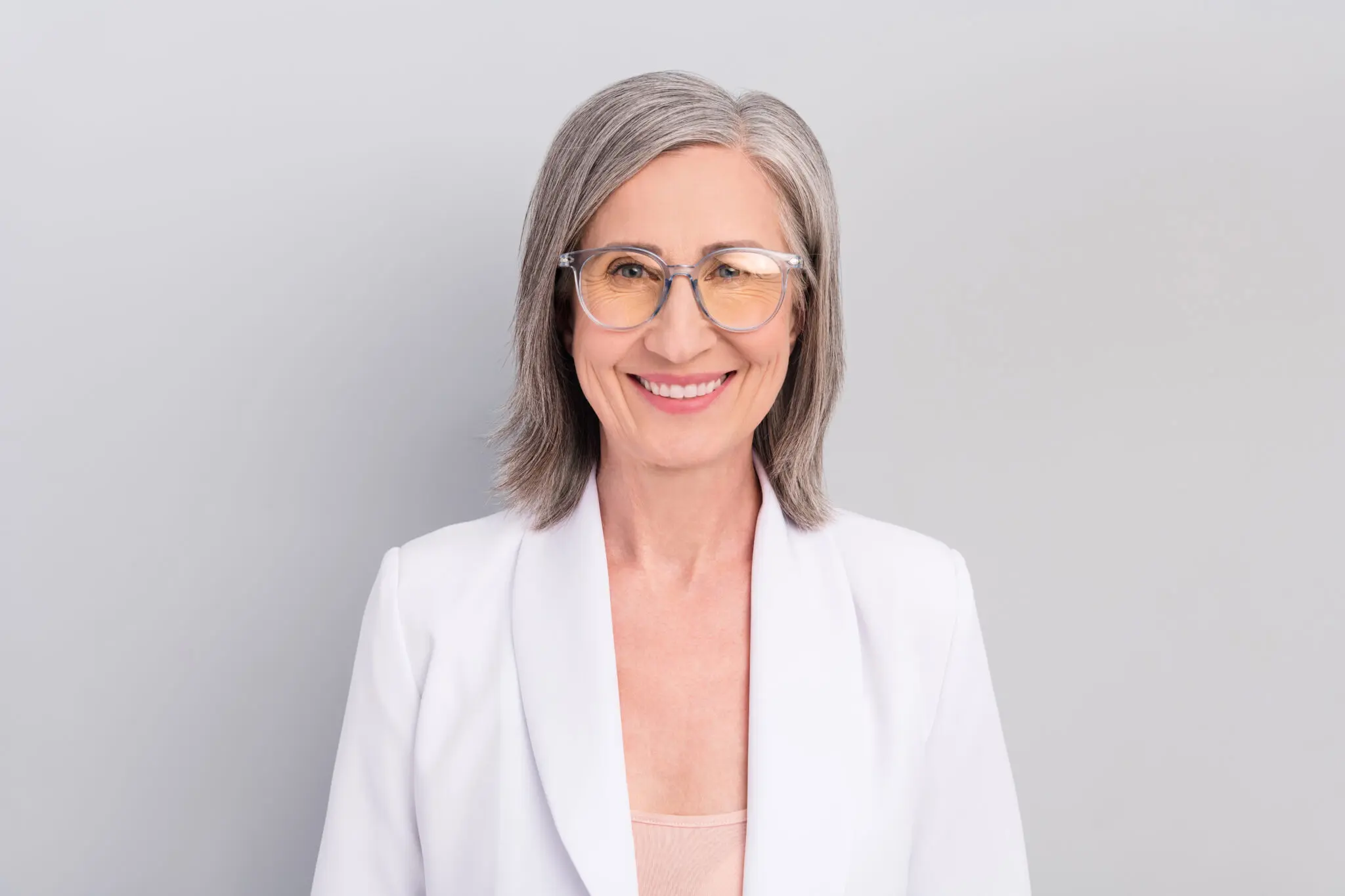 Confident woman in professional attire smiling