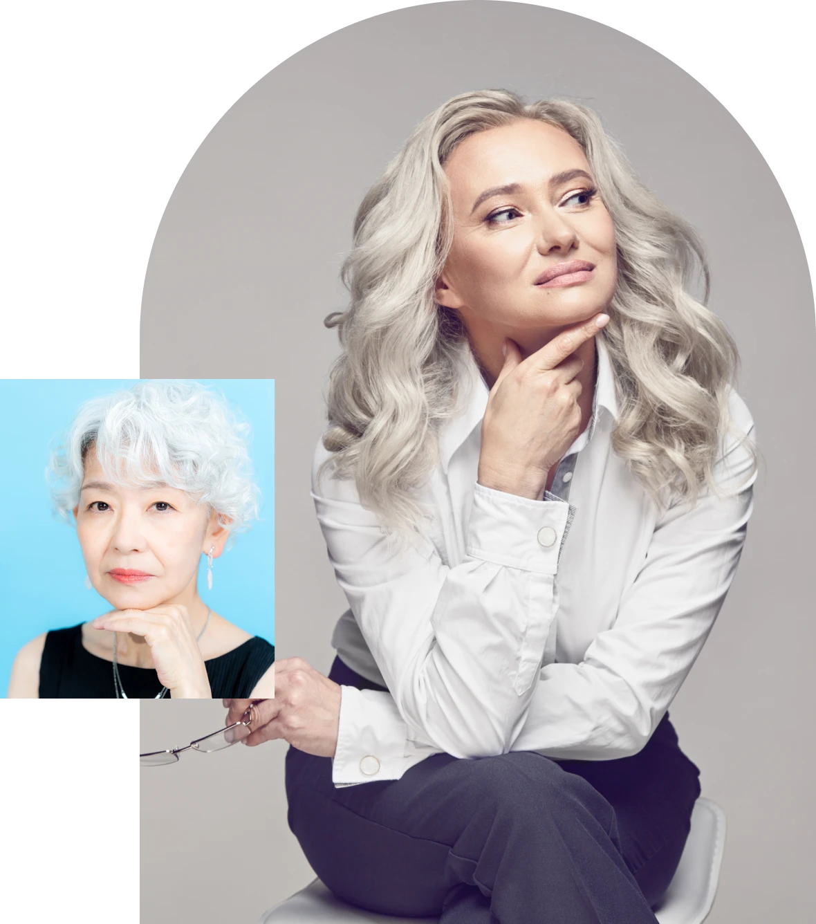 Woman with gray hair posing confidently