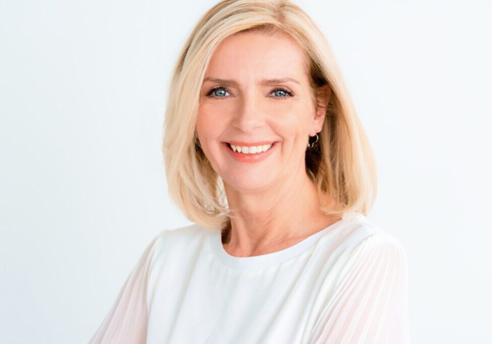 Smiling woman with blonde hair